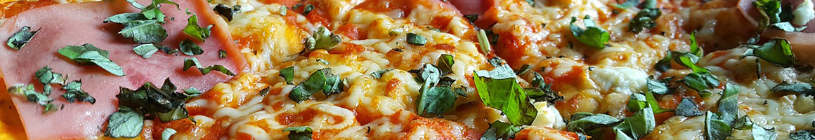 Eating Italian Pizza at Friend's Pizza Lehigh Acres restaurant in Lehigh Acres, FL.